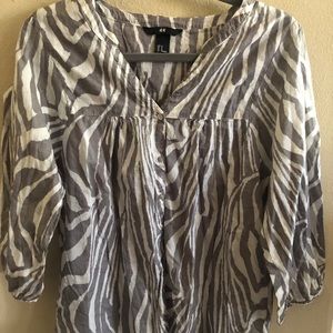 Gray and white zebra print button top